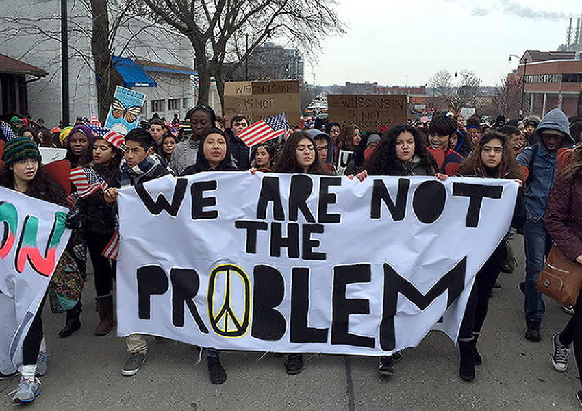 Students from East High School in Madison, WI marching