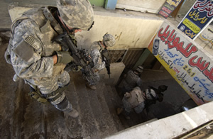 Soldiers from the U.S. Army's 2nd Battalion on a patrol in Mosul, Iraq, on Nov. 2, 2005. (DoD photo by Staff Sgt. James L. Harper Jr., U.S. Air Force)