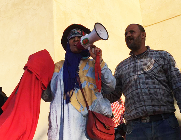 Many groups in Marrakech, Morocco, assemble and make speeches.