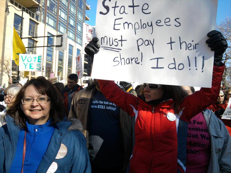 State employees must pay their share! (Photo submitted by Katie Zaman in Madison, Wisconsin)