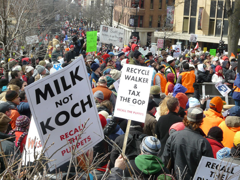 Protesters rally on State St in Madison, WI, Saturday, 03-12-2011