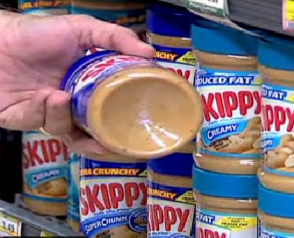 Skippy peanut butter jars now have an inward "dimple" on the bottom to reduce the amount they hold. (Source: CNN)