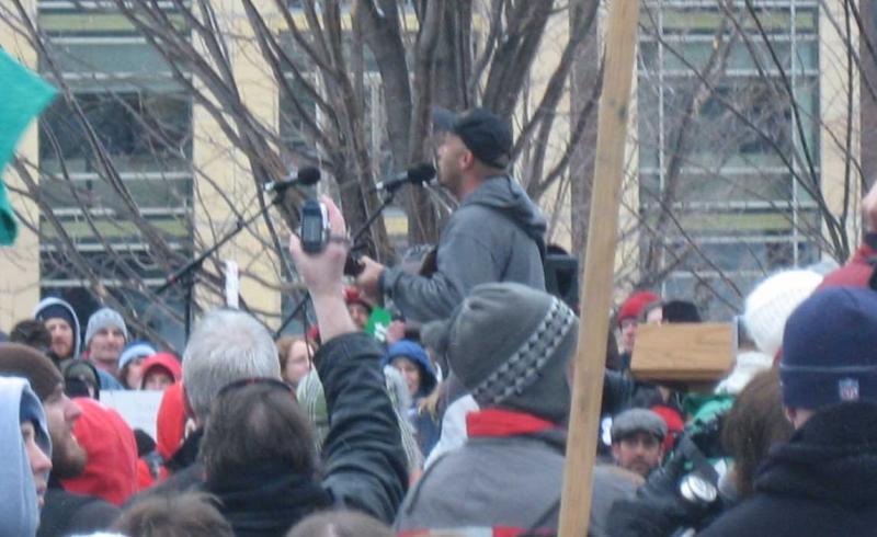 Tom Morello, the Nightwatchman, performs at rally in Madison