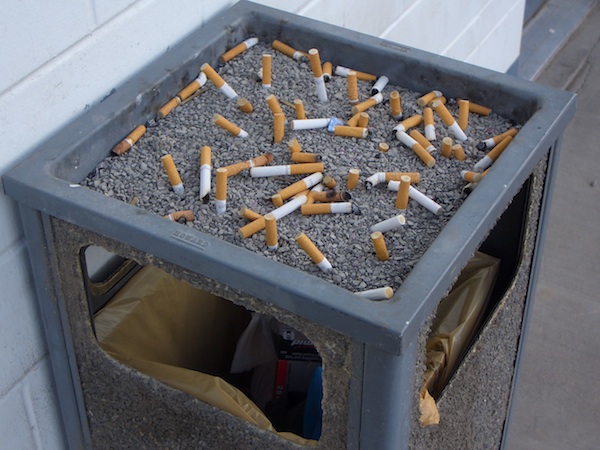 Trash receptacle with ashtray top