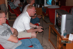 Guys playing videogames